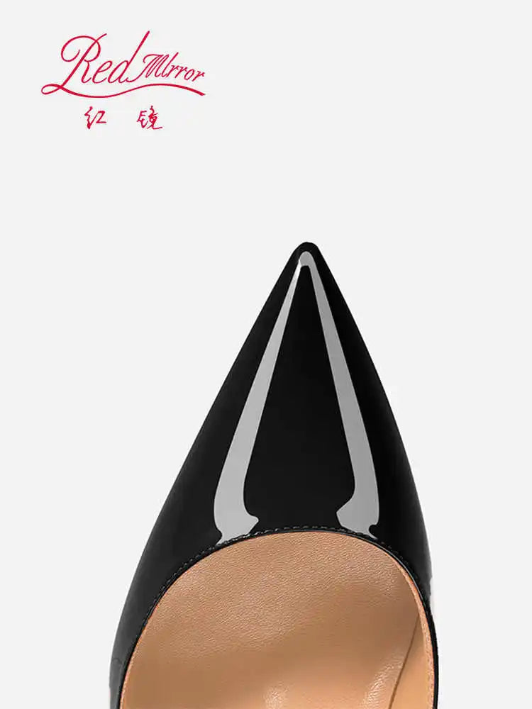 Black Pointed Heels with Red Shiny Bottoms